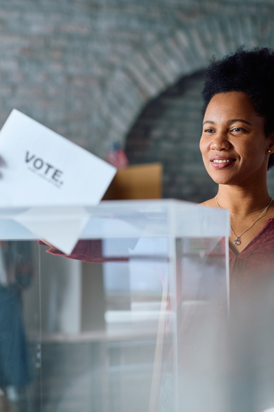 a woman casting her vote