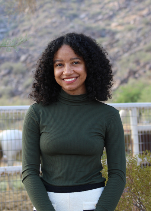 Kierra O. posing for the camera outside
