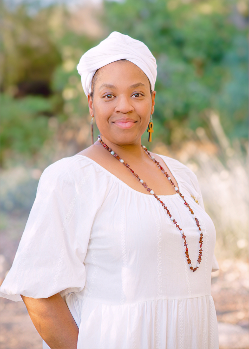 Lakisa Muhammad standing in the desert